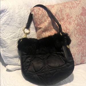 Coach purse with fur